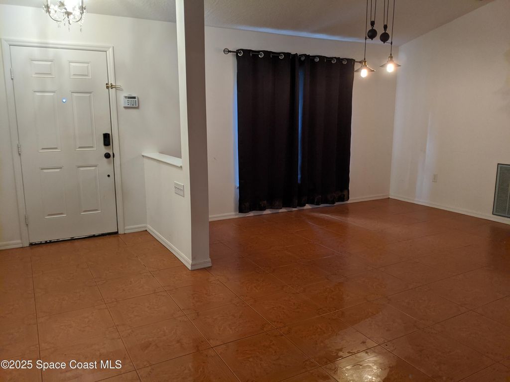 Photo of 690 Henlock Street SE, Palm Bay, FL 32909 (MLS # 1055997)