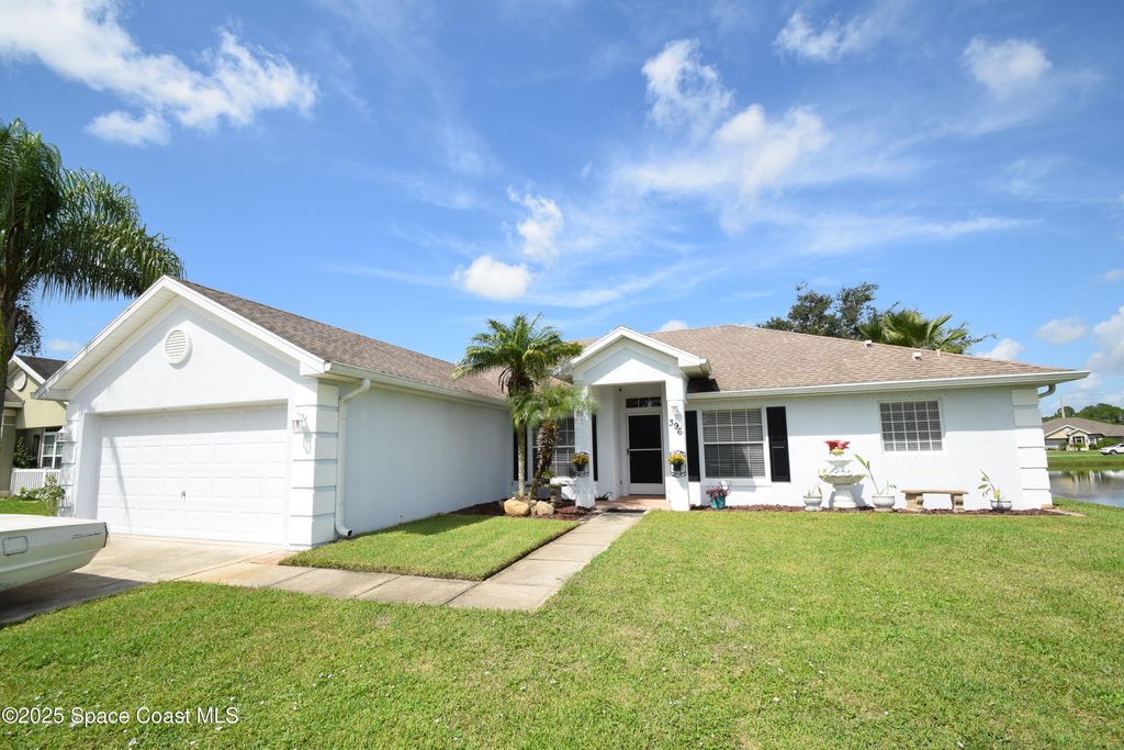 Photo of 396 Pasto Circle SW, Palm Bay, FL 32908 (MLS # 1055919)