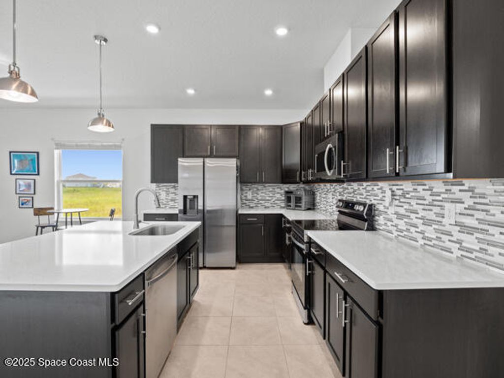 Photo of 1226 Kylar Drive NW, Palm Bay, FL 32907 (MLS # 1055957)