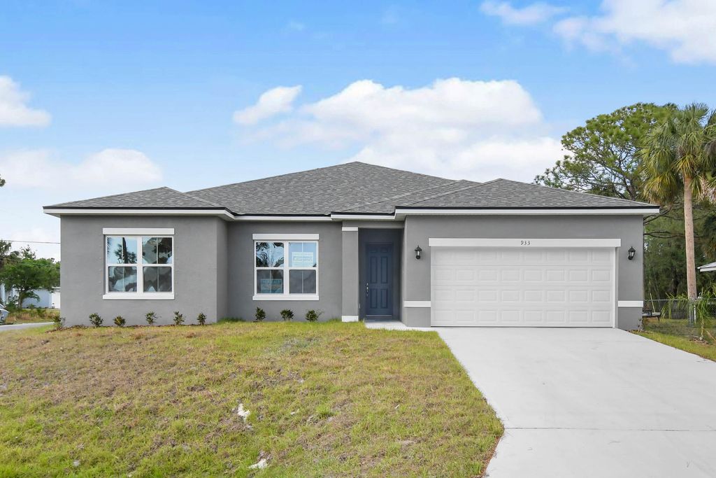 Photo of 933 Tupelo Road SW, Palm Bay, FL 32908 (MLS # 1055838)