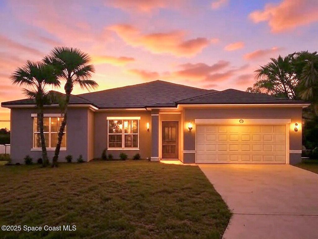 Photo of 933 Tupelo Road SW, Palm Bay, FL 32908 (MLS # 1055838)