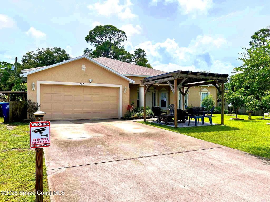 Photo of 200 Delmonico Street NE, Palm Bay, FL 32907 (MLS # 1057586)