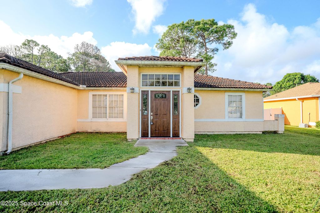 Photo of 42 Emerson Drive NW, Palm Bay, FL 32907 (MLS # 1059289)