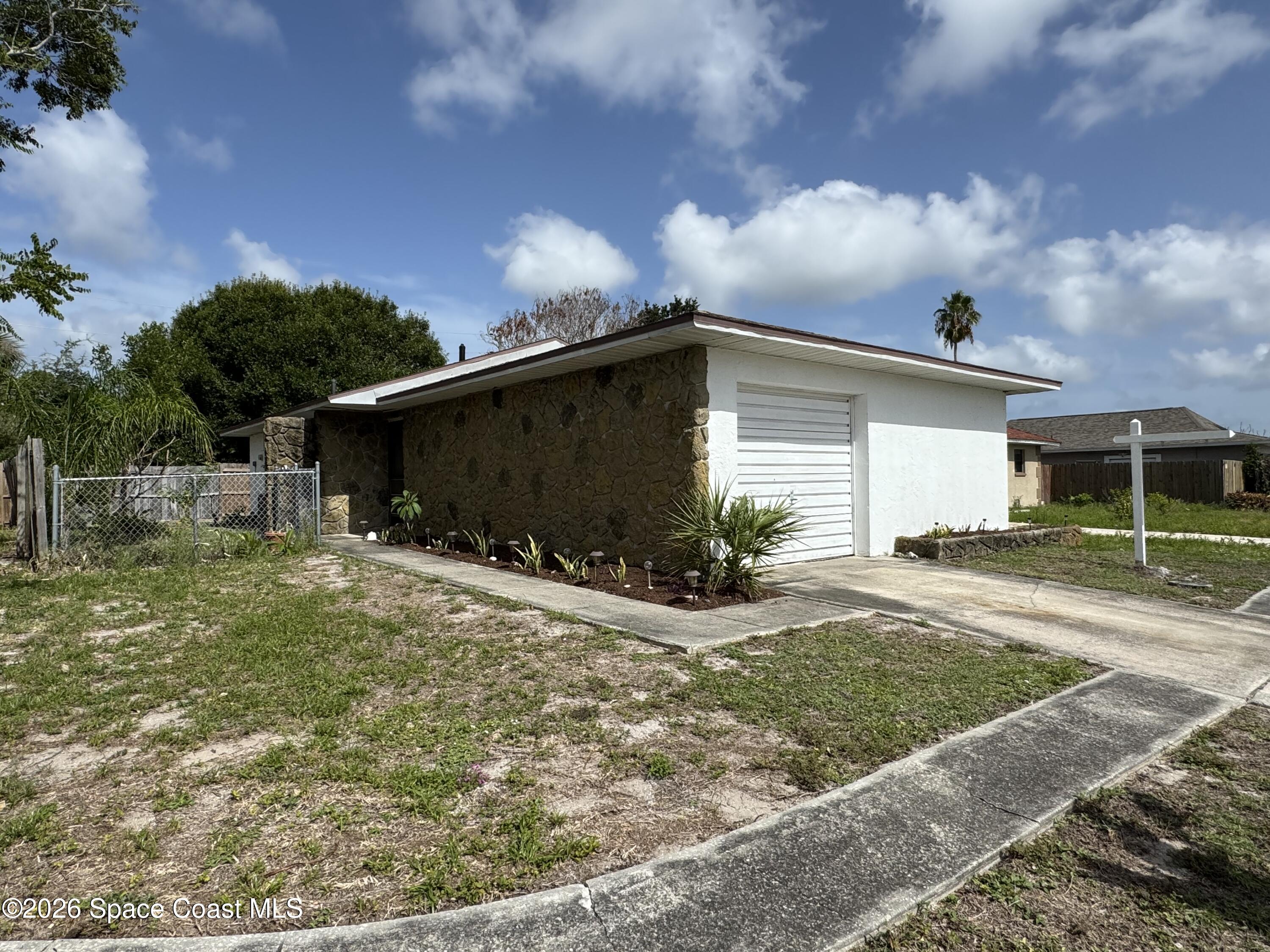 Photo 1 of 20 — 125 S Rosiland Court, Merritt Island, FL 32952