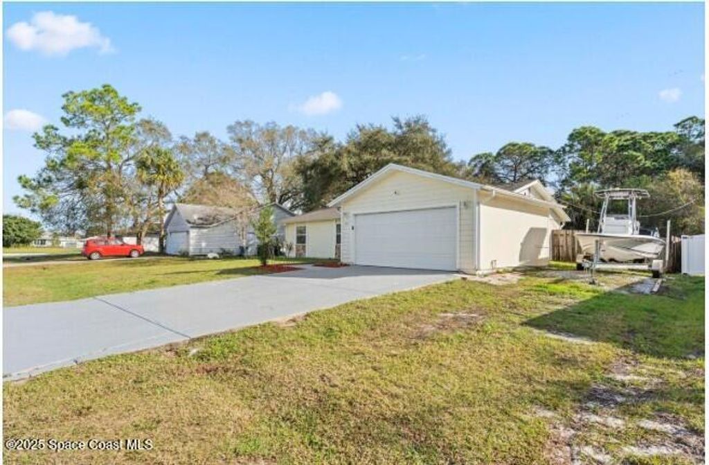 Photo of 871 Dunkirk Avenue NW, Palm Bay, FL 32907 (MLS # 1055994)