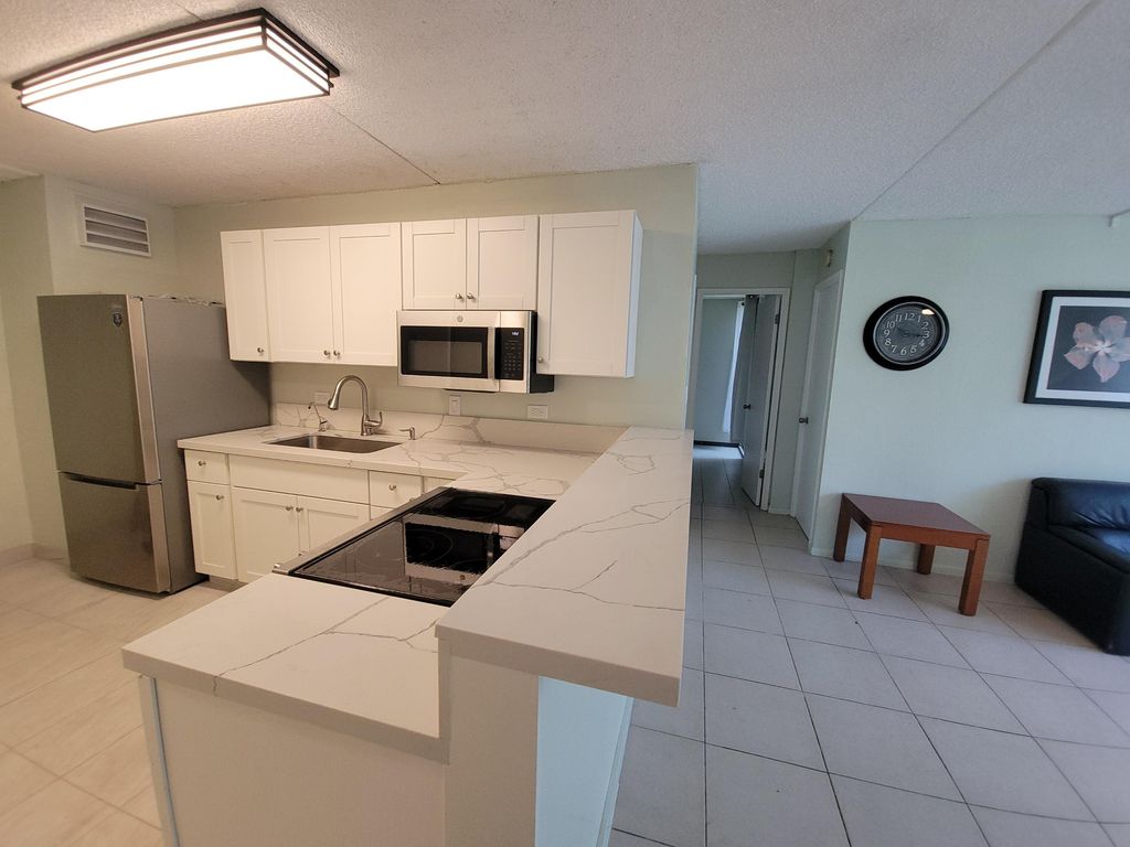 Photo of 111 Kahului Beach Rd #B-213, Kahului, HI 96732 (MLS # 406320)