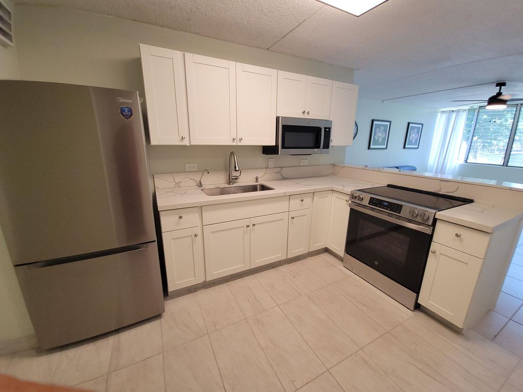 Photo of 111 Kahului Beach Rd #B-213, Kahului, HI 96732 (MLS # 406320)