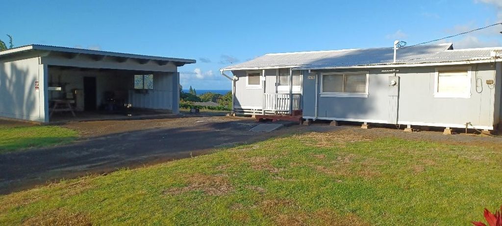 Photo of 2676 Kalanikahua Rd, Haiku, HI 96708 (MLS # 407070)
