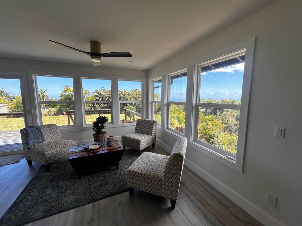 Photo of 1139 Kauhikoa Rd #A, Haiku, HI 96708 (MLS # 408063)