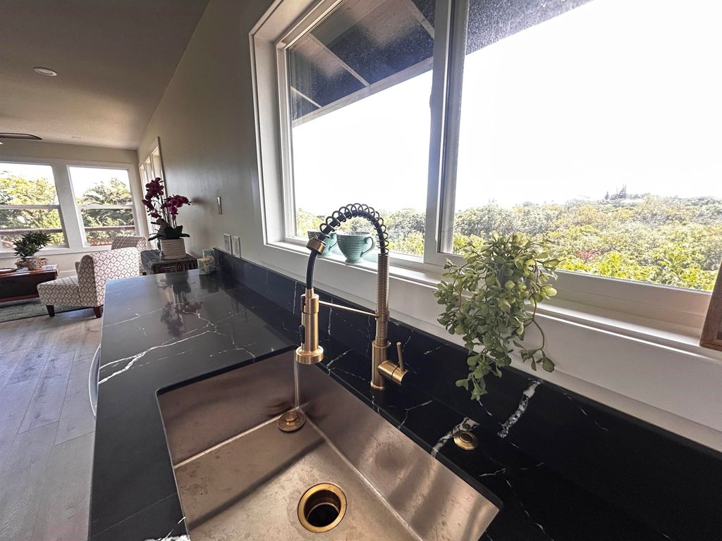 Photo of 1139 Kauhikoa Rd #A, Haiku, HI 96708 (MLS # 408063)