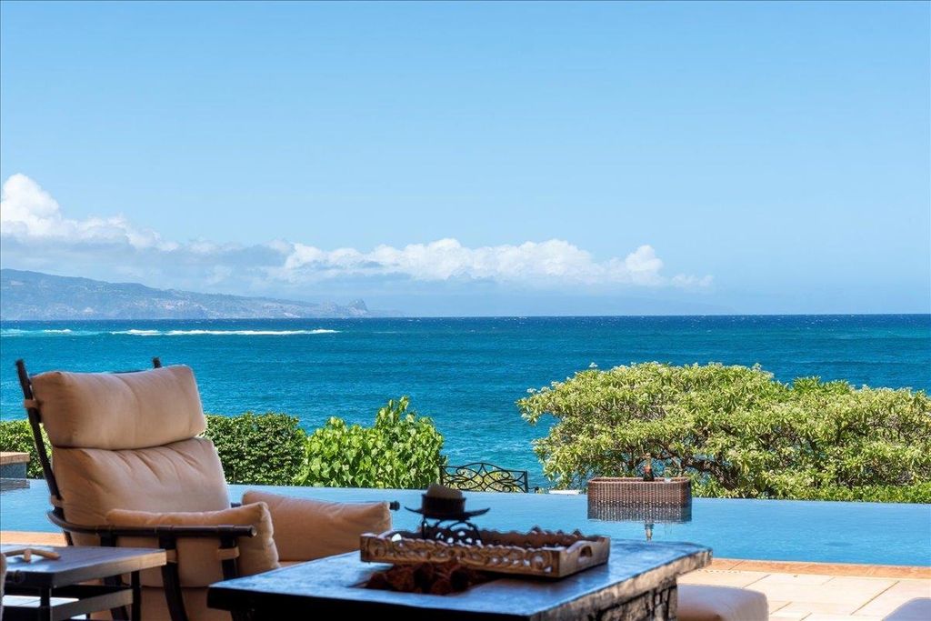 Photo of 21 Kaulua Pl, Paia, HI 96779 (MLS # 405426)