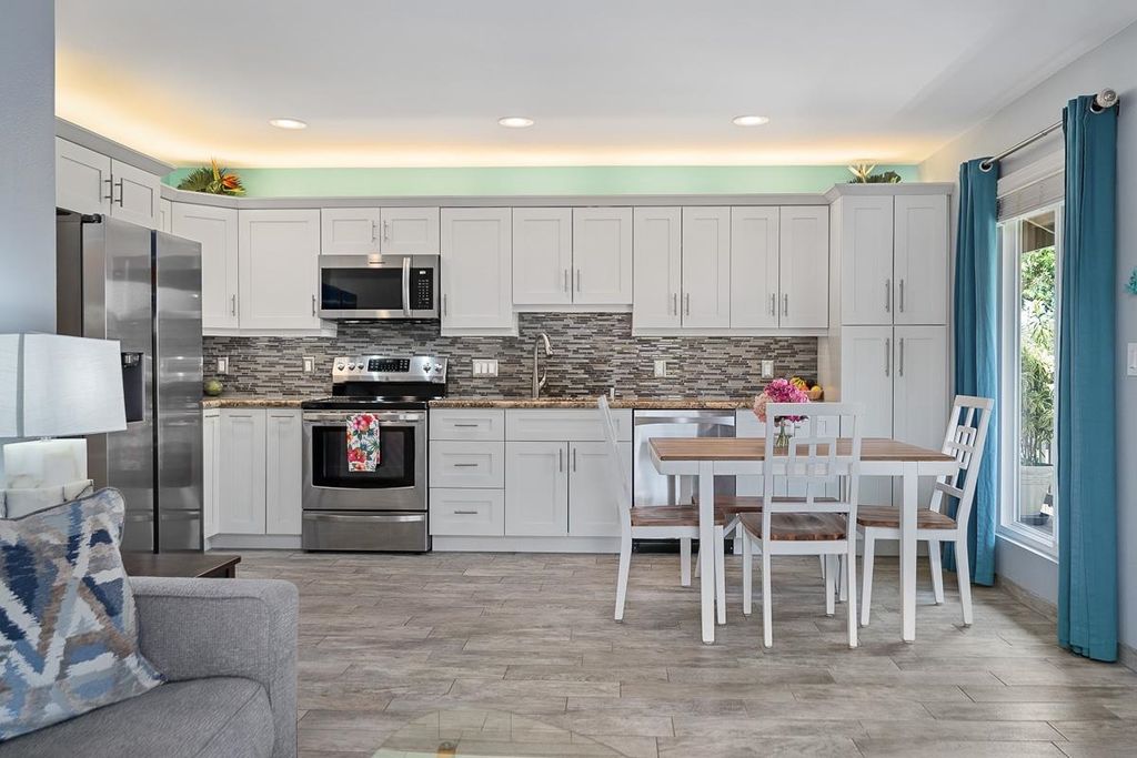 Photo of 480 Kenolio Rd #2-202, Kihei, HI 96753 (MLS # 407074)