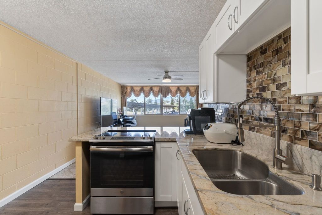 Photo of 111 Kahului Beach Rd #A203, Kahului, HI 96732 (MLS # 405607)