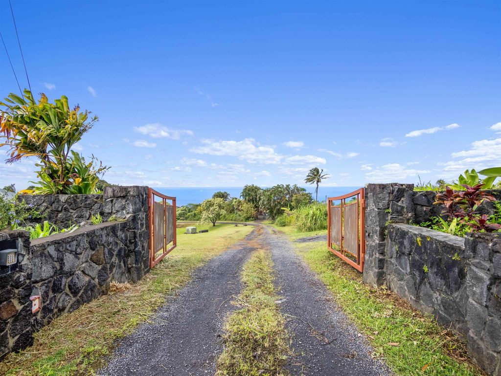 Photo of 44 Hanauana Rd, Haiku, HI 96708 (MLS # 406566)