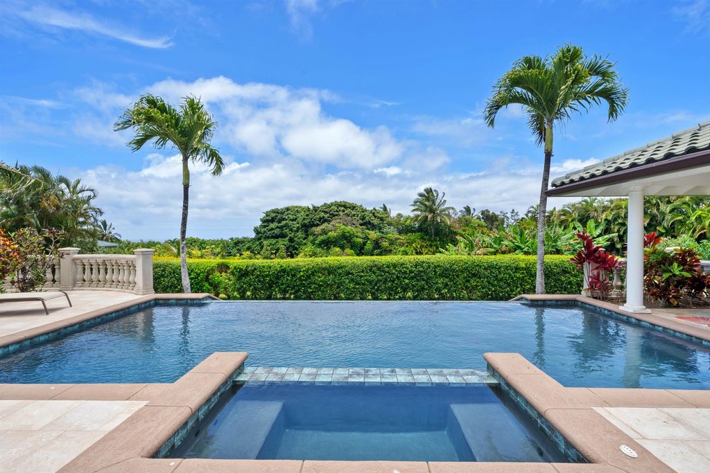 Photo of 20 Kapuaimilia Pl, Haiku, HI 96708 (MLS # 406768)