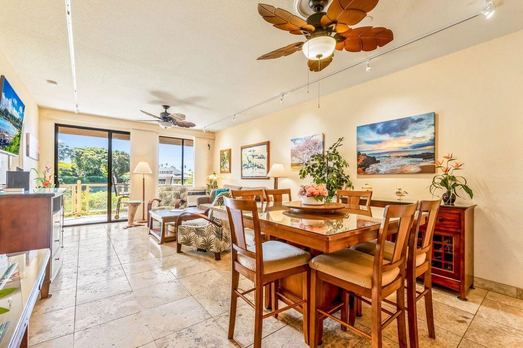 Photo of 155 Wailea Ike Pl #111, Kihei, HI 96753 (MLS # 407428)