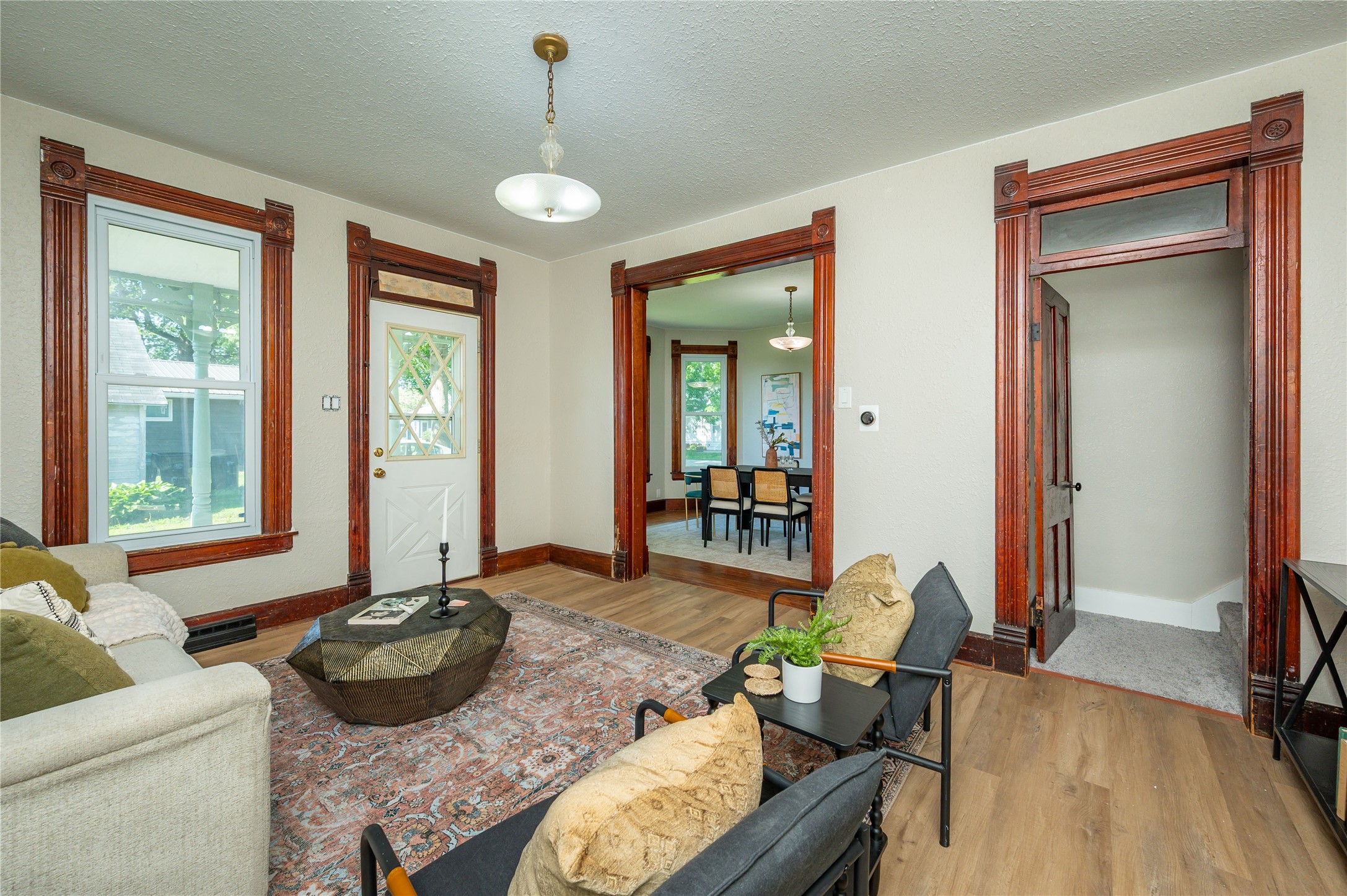 Photo 1 of 28 — 103 N Dewey Street, Prairie City, IA 50228