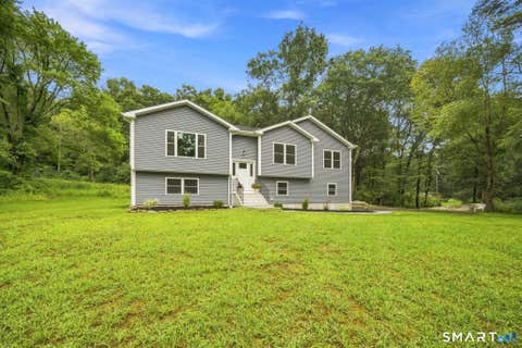 Photo of 319 Old Stafford Road, Tolland, CT 06084 (MLS # 24200675)