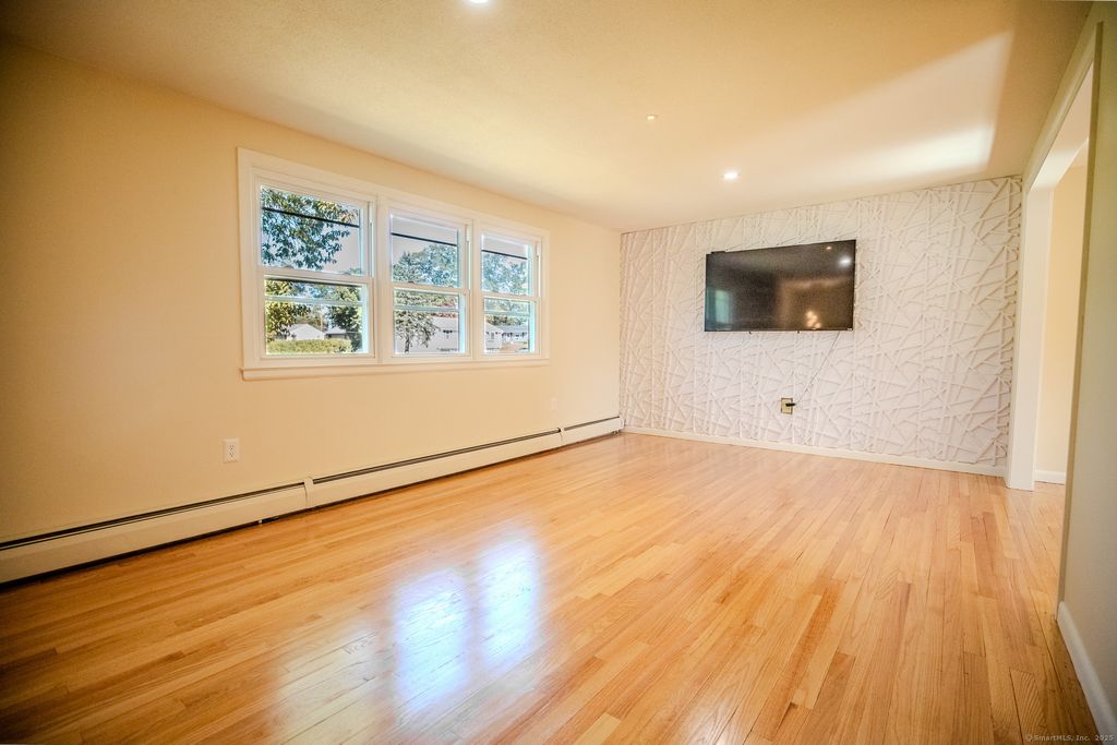 Photo of 25 Patriot Road, Windsor, CT 06095 (MLS # 24129878)