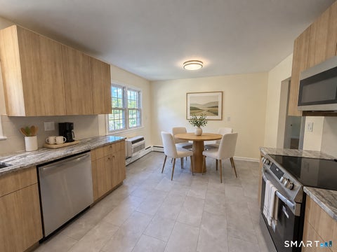 Photo of 949 Hopmeadow Street, Simsbury, CT 06070 (MLS # 24209392)