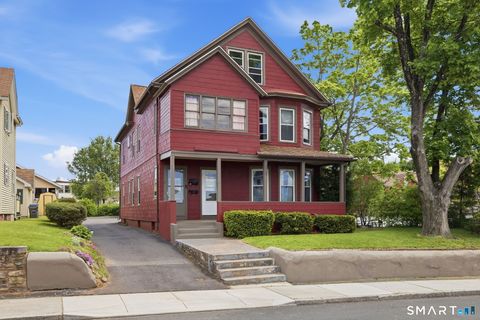 Photo of 9-11 Griswold Street, Manchester, CT 06040 (MLS # 24175116)