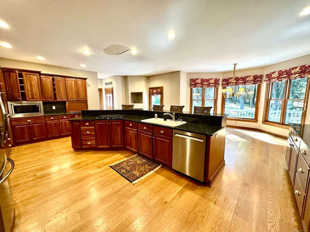 Photo of 721 Marshall Lake Road, Torrington, CT 06790 (MLS # 24130946)