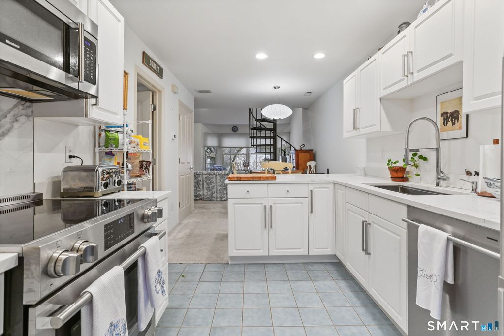 Photo of 77 Locust Avenue #APT 124, New Canaan, CT 06840 (MLS # 24149618)