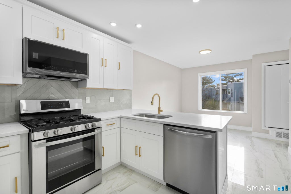 Photo of 23 Birch Lane #H, East Haven, CT 06513 (MLS # 24208640)