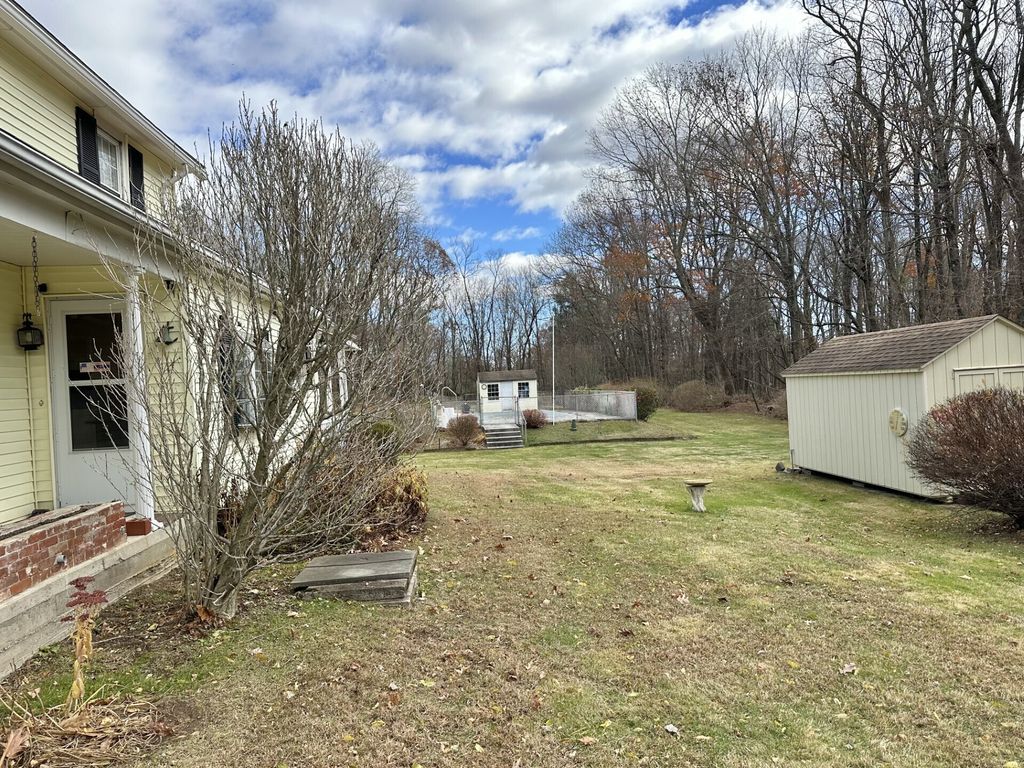 Photo of 487 Plainville Avenue, Farmington, CT 06085 (MLS # 24141457)