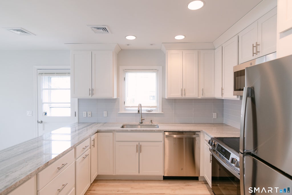 Photo of 55 Cos Cob Avenue, Greenwich, CT 06807 (MLS # 24201010)