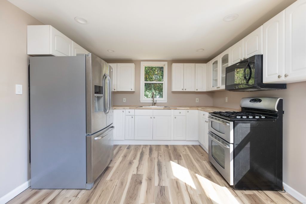 Photo of 11 River Street, Griswold, CT 06351 (MLS # 24133420)