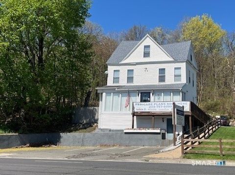 Photo of 447 Wolcott Street, Waterbury, CT 06705 (MLS # 24157157)