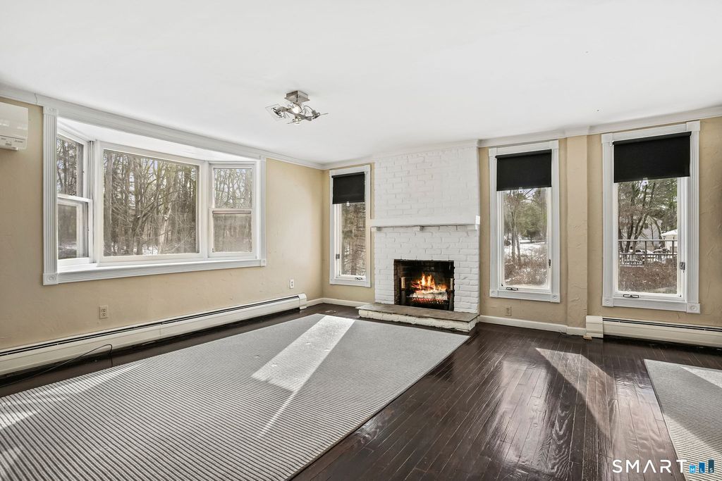 Photo of 12 Skidmore Lane, Newtown, CT 06482 (MLS # 24150730)