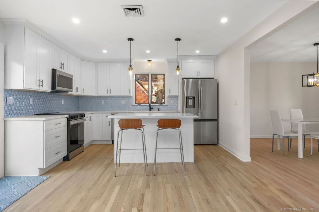 Photo of 7 Brett Cliff Road, Milford, CT 06461 (MLS # 24144066)