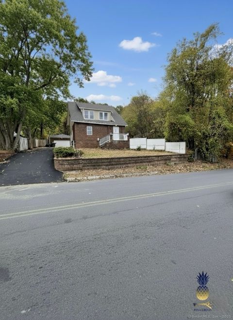 Photo of 311 Wolcott Street, Waterbury, CT 06705 (MLS # 24135167)