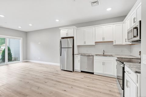 Tiny photo for 303 Bridgeport Avenue #205, Shelton, CT 06484 (MLS # 24143411)