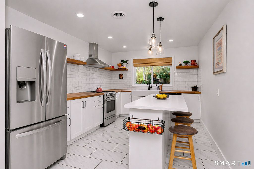 Photo of 76 Gillies Lane #76, Norwalk, CT 06854 (MLS # 24167486)