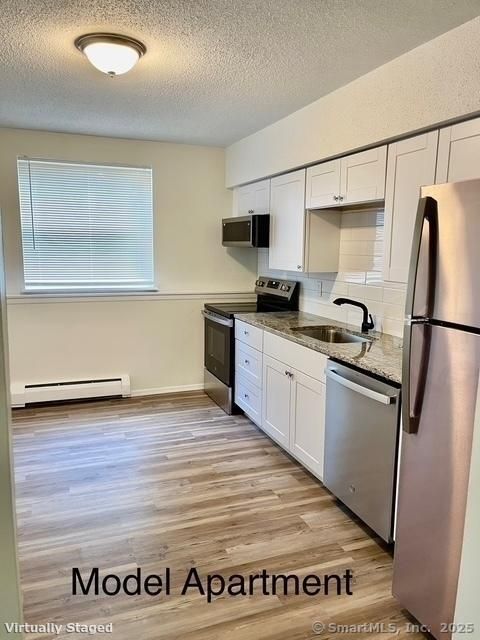 Tiny photo for 100 Norton Park Road #1E1, Plainville, CT 06062 (MLS # 24117986)