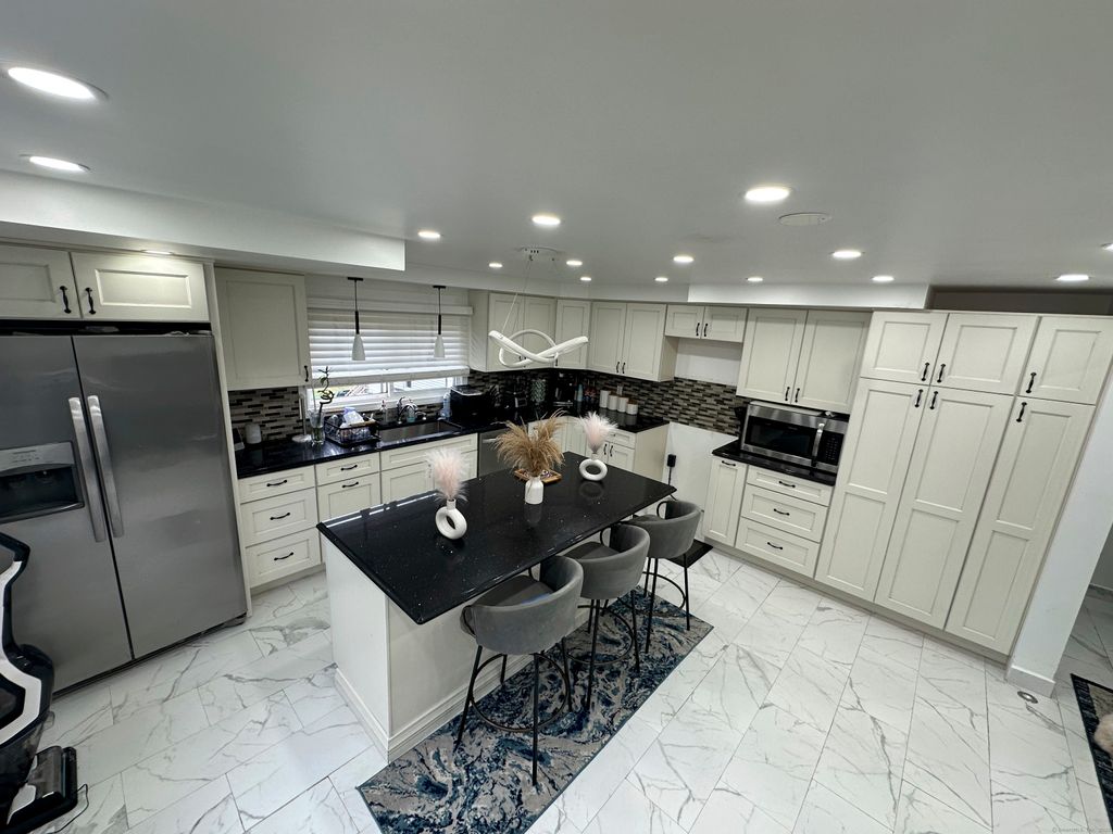 Photo of 39 Draper Avenue, Meriden, CT 06450 (MLS # 24133368)