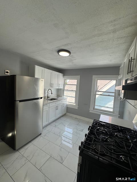 Photo of 146 Farren Avenue, New Haven, CT 06513 (MLS # 24200470)