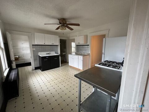 Photo of 22 Donahue Place, Torrington, CT 06790 (MLS # 24147592)