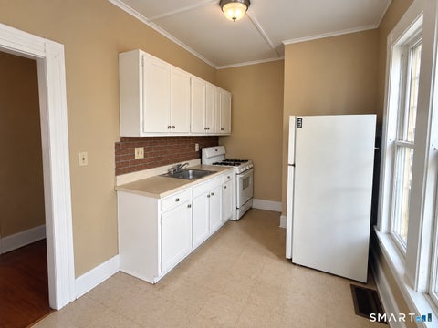 Photo of 271 S Main Street, Torrington, CT 06790 (MLS # 24210785)