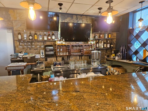 Photo of 50 West Main Street, Plainville, CT 06062 (MLS # 24211033)