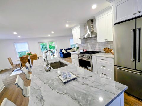 Photo of 12 Woodland Drive, Milford, CT 06460 (MLS # 24134141)