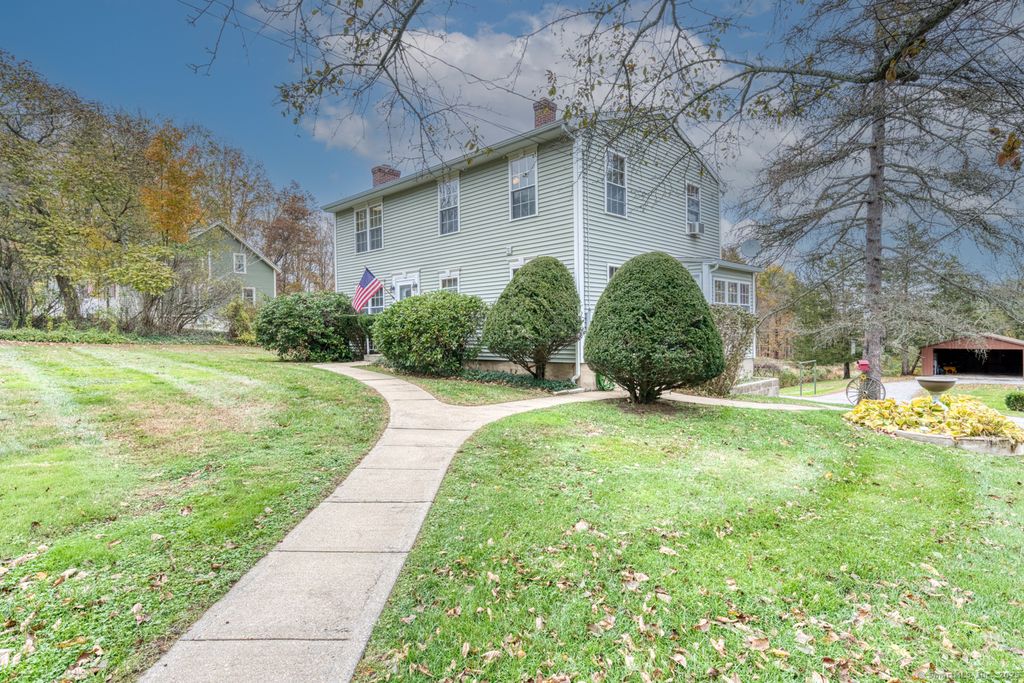 Photo of 408 Storrs Road, Mansfield, CT 06250 (MLS # 24133083)