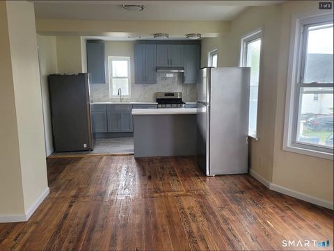 Photo of 166 Sixth Street, Bridgeport, CT 06607 (MLS # 24179359)