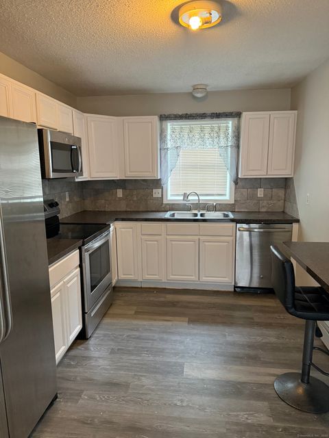 Photo of 12-14 Harbison Avenue #1st Floor, Hartford, CT 06106 (MLS # 24140882)