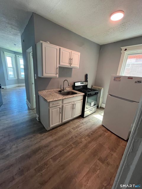 Photo of 267 Wethersfield Avenue, Hartford, CT 06114 (MLS # 24170222)