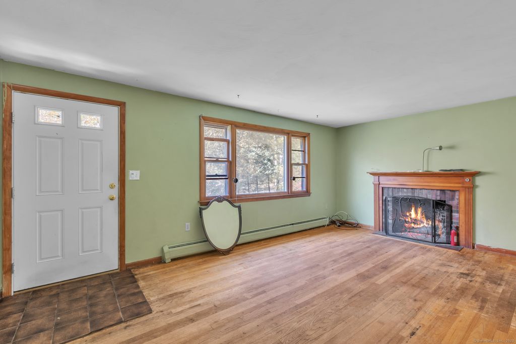 Photo of 644 Buff Cap Road, Tolland, CT 06084 (MLS # 24133204)