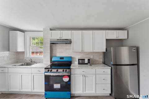 Tiny photo for 76 Rockville Road, East Windsor, CT 06016 (MLS # 24197717)